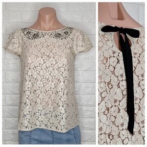 LOFT Metallic Lvae Baby Doll Top with Embellished Bib Neckline and Bow Tie Back